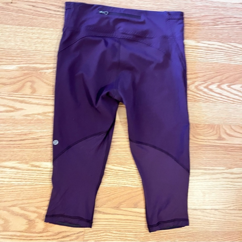 Lululemon Purple Cropped Athletic Leggings zippered back Pocket size 8